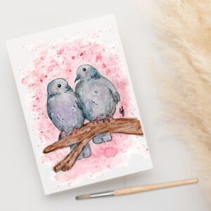 Foto van ansichtkaart met een aquarelschildering van twee Turkse tortels