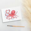 Foto van ansichtkaart met aquarel van octopus