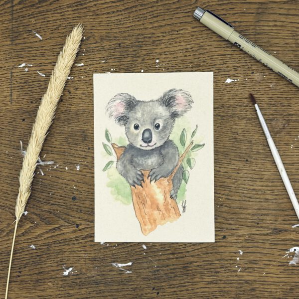 Foto van een ansichtkaart met een aquarelschildering van een koalabeer uit Ouwehands dierenpark