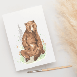 Foto van een ansichtkaart met een aquarelschildering van een beer